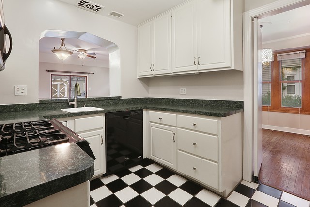 18427 Stewart Avenue Homewood, IL 60430 - Photo 4 of 13 a kitchen with granite countertop a stove a sink and dishwasher