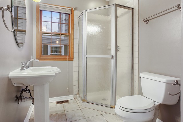 18427 Stewart Avenue Homewood, IL 60430 - Photo 10 of 13 a bathroom with a sink toilet and shower