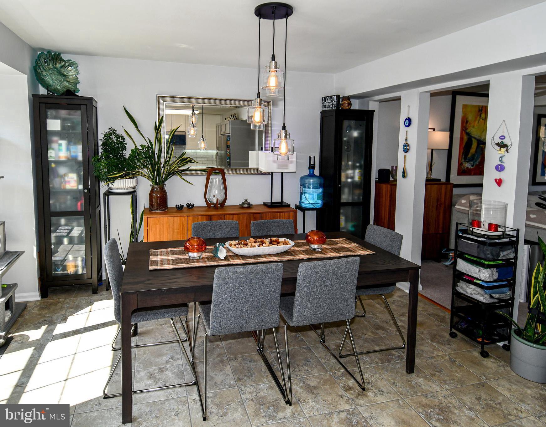 10188 Speedwell Court Manassas, VA 20110 - Photo 23 of 51 a view of a dining room with furniture