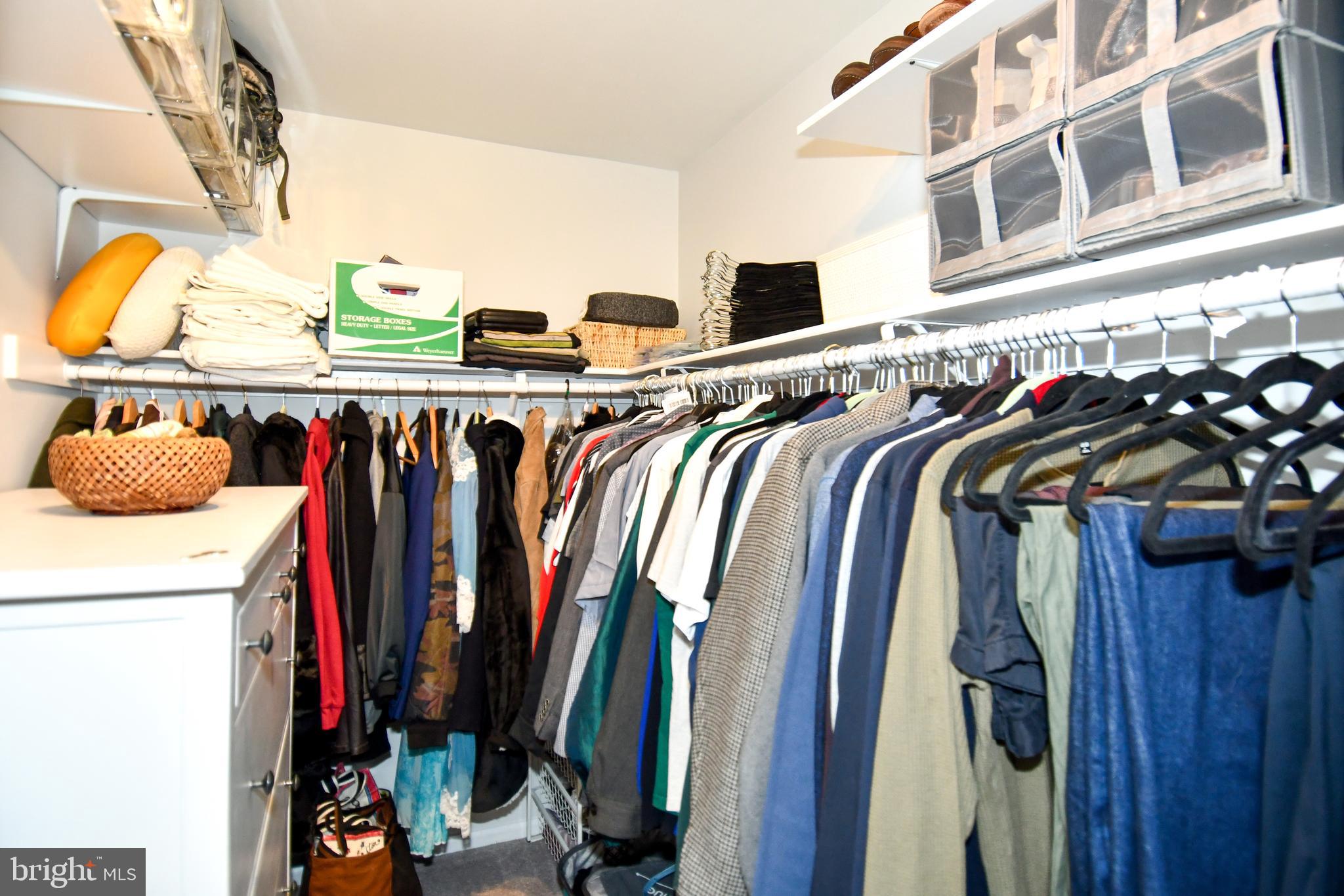 10188 Speedwell Court Manassas, VA 20110 - Photo 28 of 51 a view of walk in closet with clothes and shoes