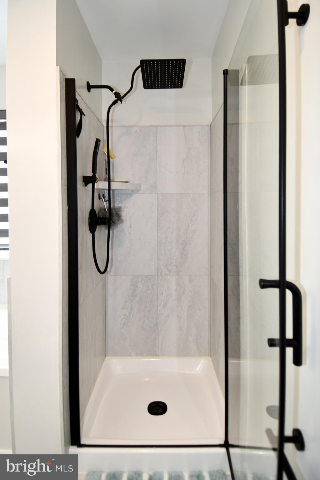 10188 Speedwell Court Manassas, VA 20110 - Photo 34 of 51 a bathroom with a shower