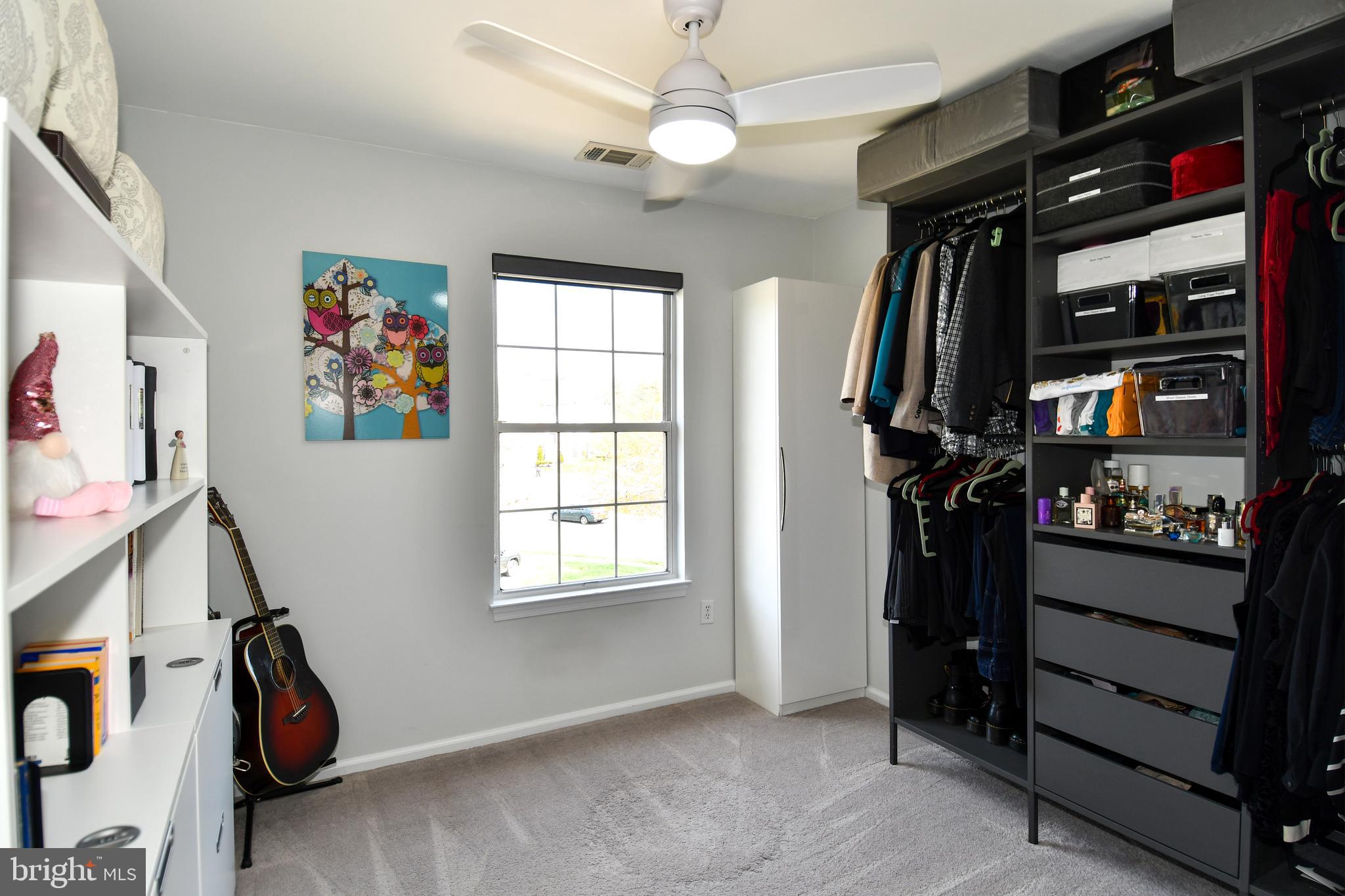 10188 Speedwell Court Manassas, VA 20110 - Photo 35 of 51 a view of walk in closet with clothes and shoes