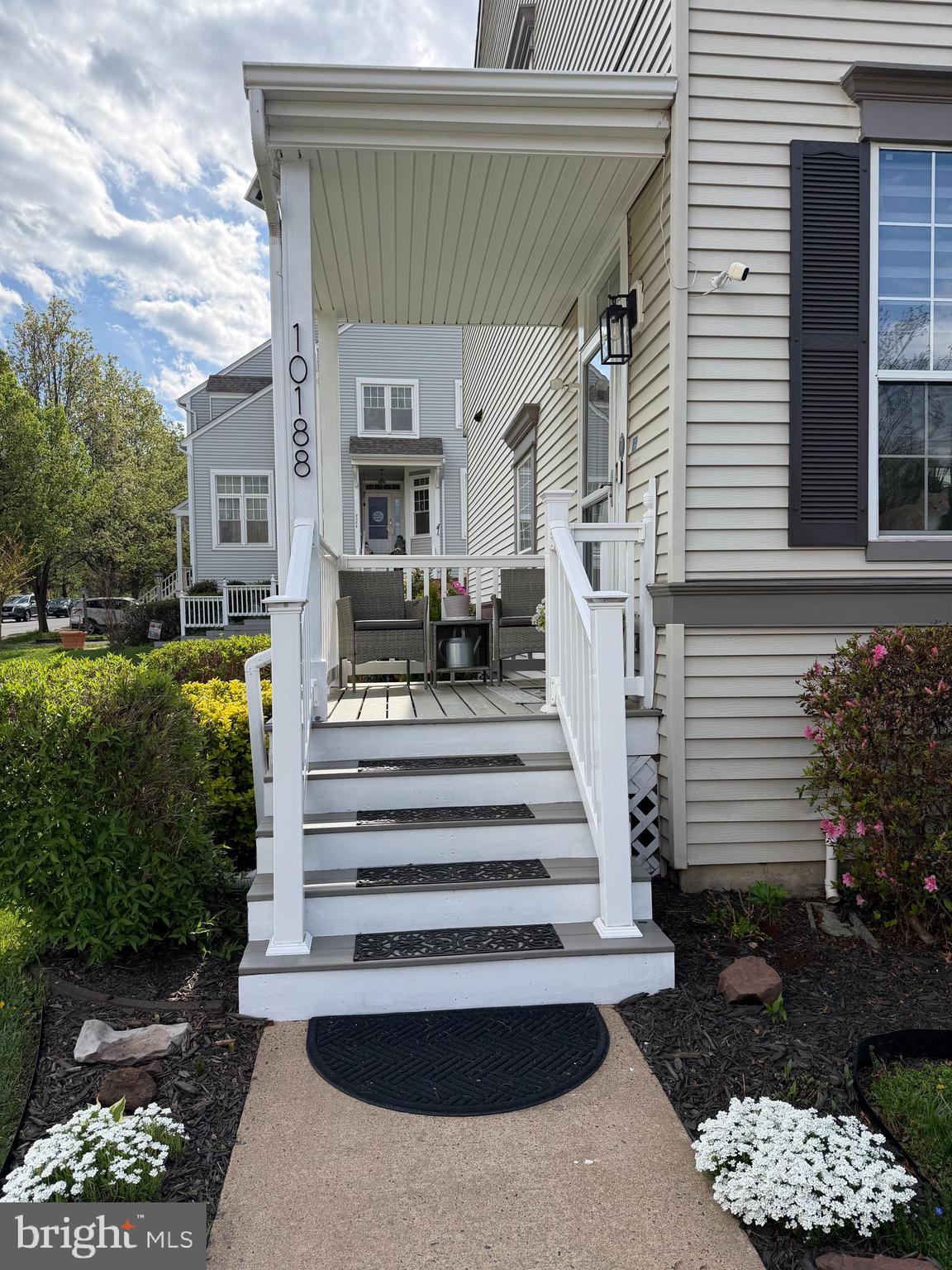 10188 Speedwell Court Manassas, VA 20110 - Photo 50 of 51 a view of a patio with table and chairs and potted plants