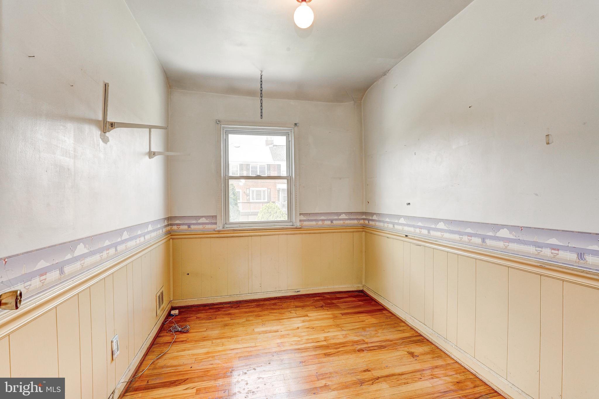 8656 Rock Oak Road Baltimore, MD 21234 - Photo 17 of 22 a view of an empty room with a window