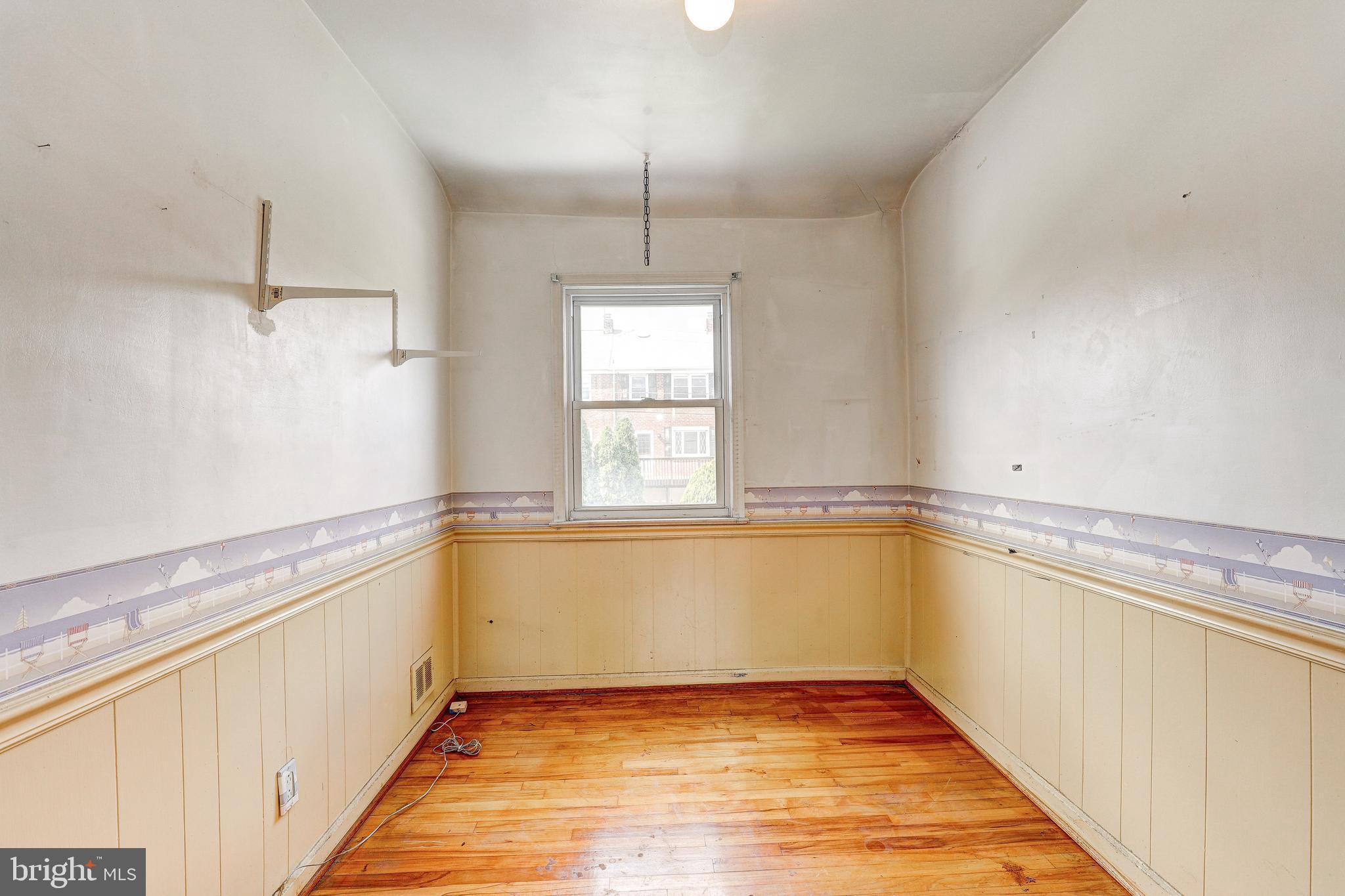 8656 Rock Oak Road Baltimore, MD 21234 - Photo 18 of 22 a view of a kitchen with wooden floor and a window