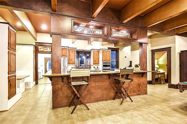 a view of a hall with dining area
