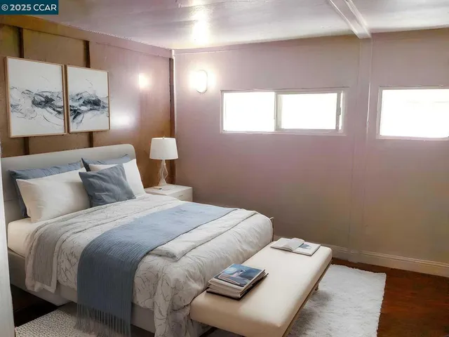 a bed room with a bed and a window