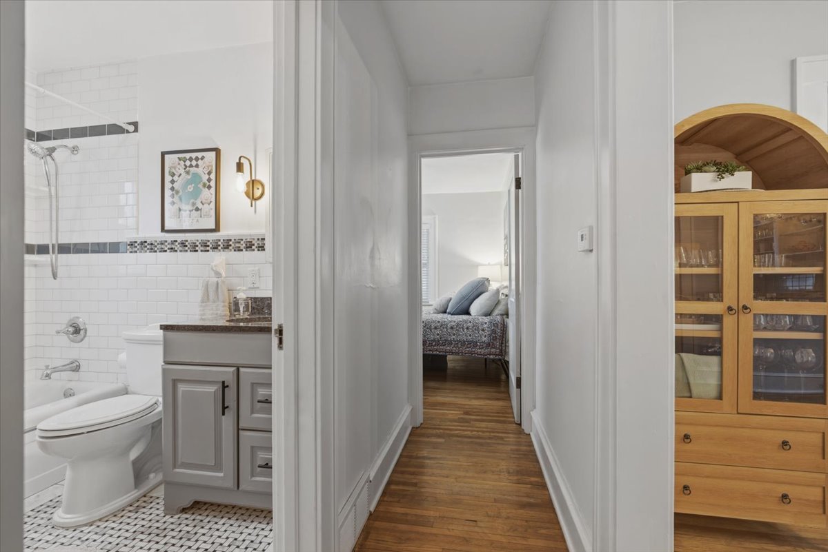 611 Vale Street Bloomington, IL 61701 - Photo 14 of 36 a en suite bathroom with a toilet a sink and a window