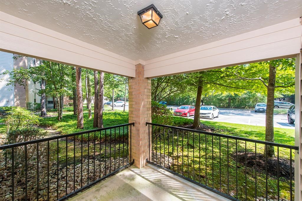 8051 Bay Branch Drive, Unit 312 The Woodlands, TX 77382 - Photo 16 of 22 a view of a street view from a balcony