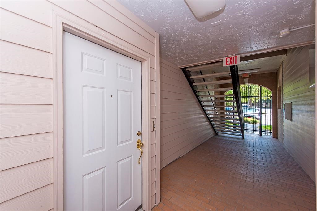 8051 Bay Branch Drive, Unit 312 The Woodlands, TX 77382 - Photo 17 of 22 a view of an empty room with a window