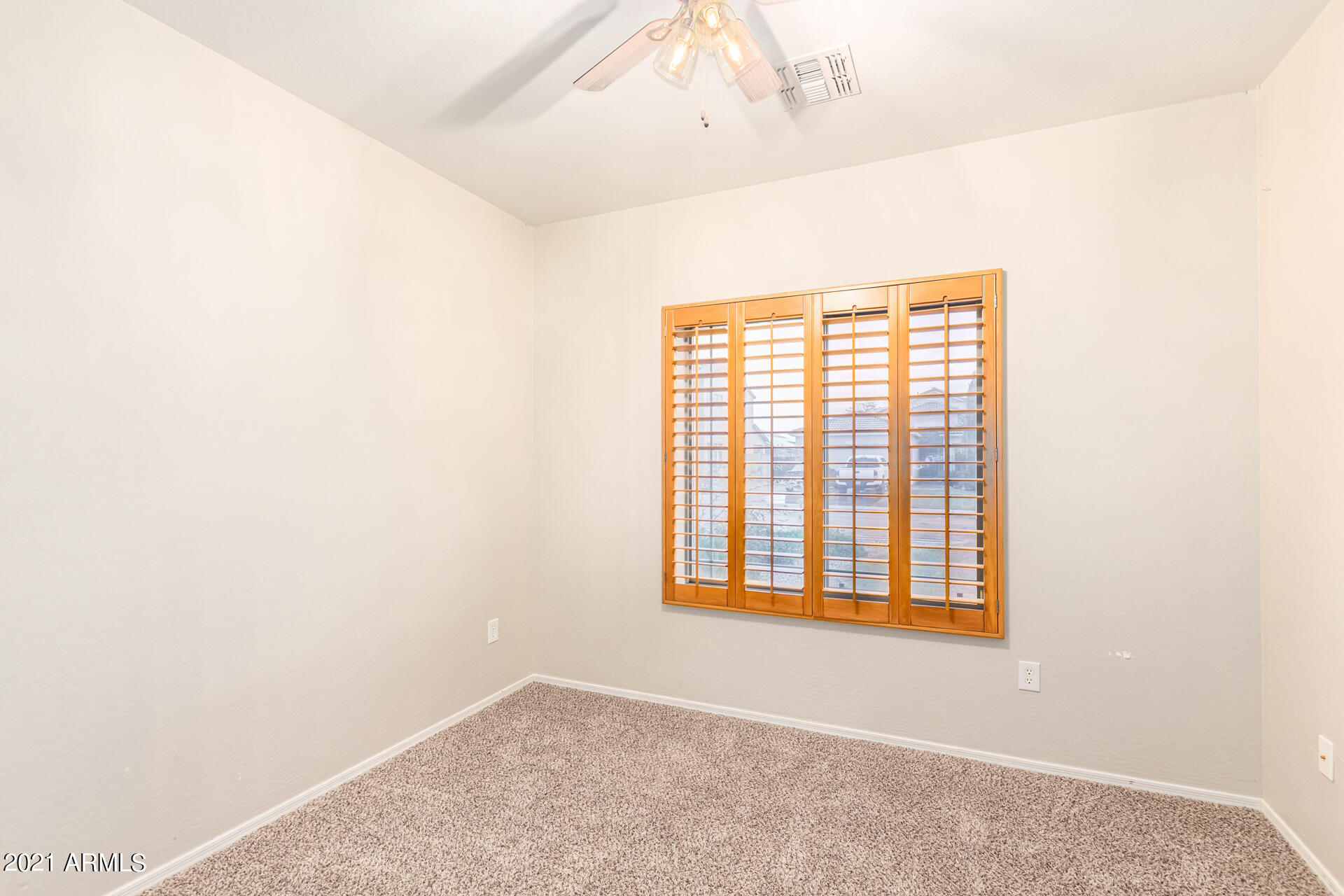 10070 East Hay Loft Road Florence, AZ 85132 - Photo 18 of 29 Secondary Bedroom with Walk-in Closet