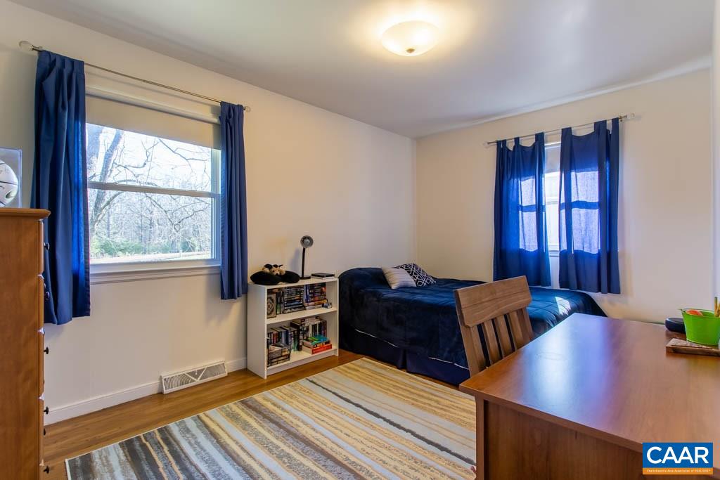 2938 Milton Road Charlottesville, VA 22902 - Photo 12 of 44 a livingroom with workspace and a window