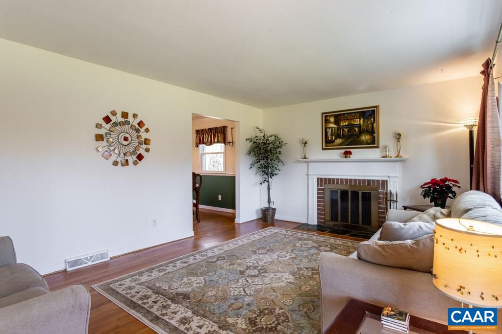 2938 Milton Road Charlottesville, VA 22902 - Photo 3 of 44 a living room with furniture and a fireplace