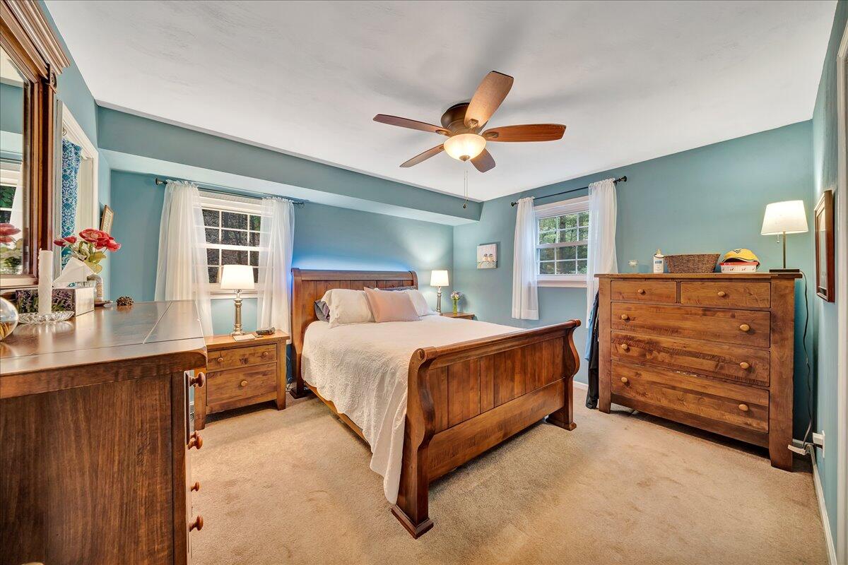 2568 Blue Ridge Springs Road Blue Ridge, VA 24064 - Photo 22 of 38 a bedroom with a bed and a dresser