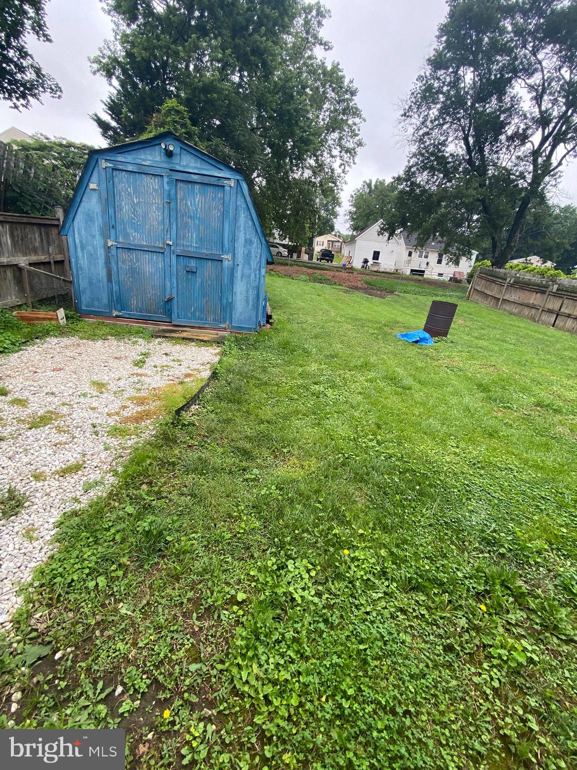 1907 Monumental Road Baltimore, MD 21227 - Photo 35 of 37 a view of backyard with wooden fence