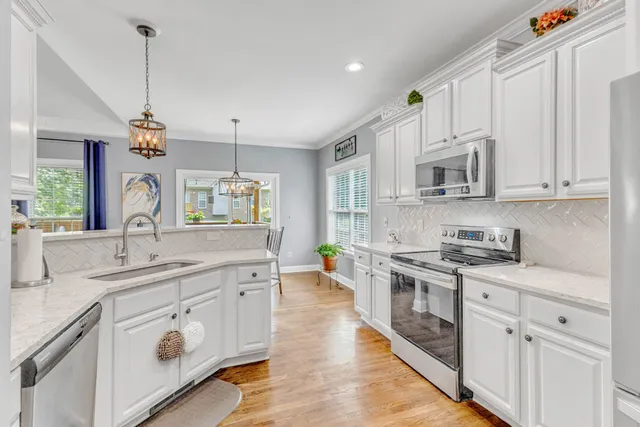 a dining room with furniture window wooden floor