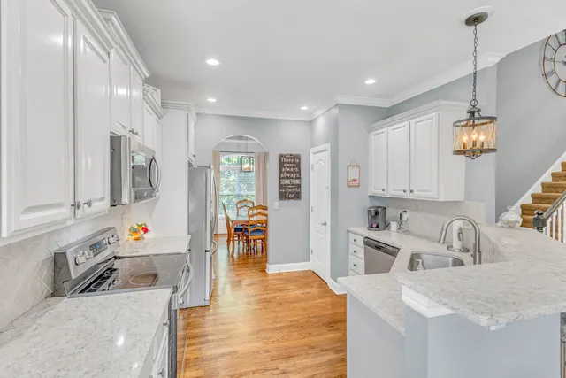 a spacious bathroom with a double vanity sink and a mirror