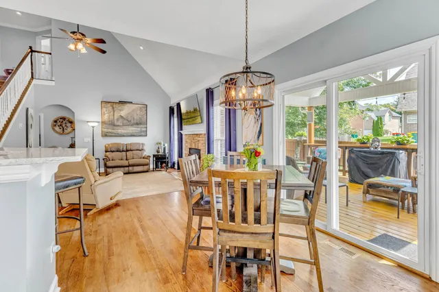 a spacious bathroom with a double vanity sink and a mirror