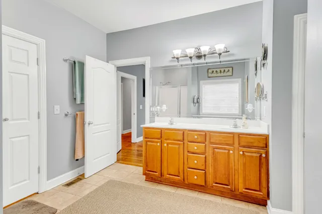 a utility room with a sink washer and dryer