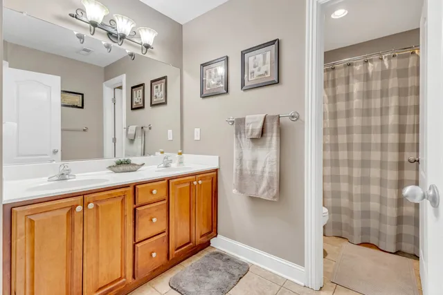 a view of backyard with seating area and green space