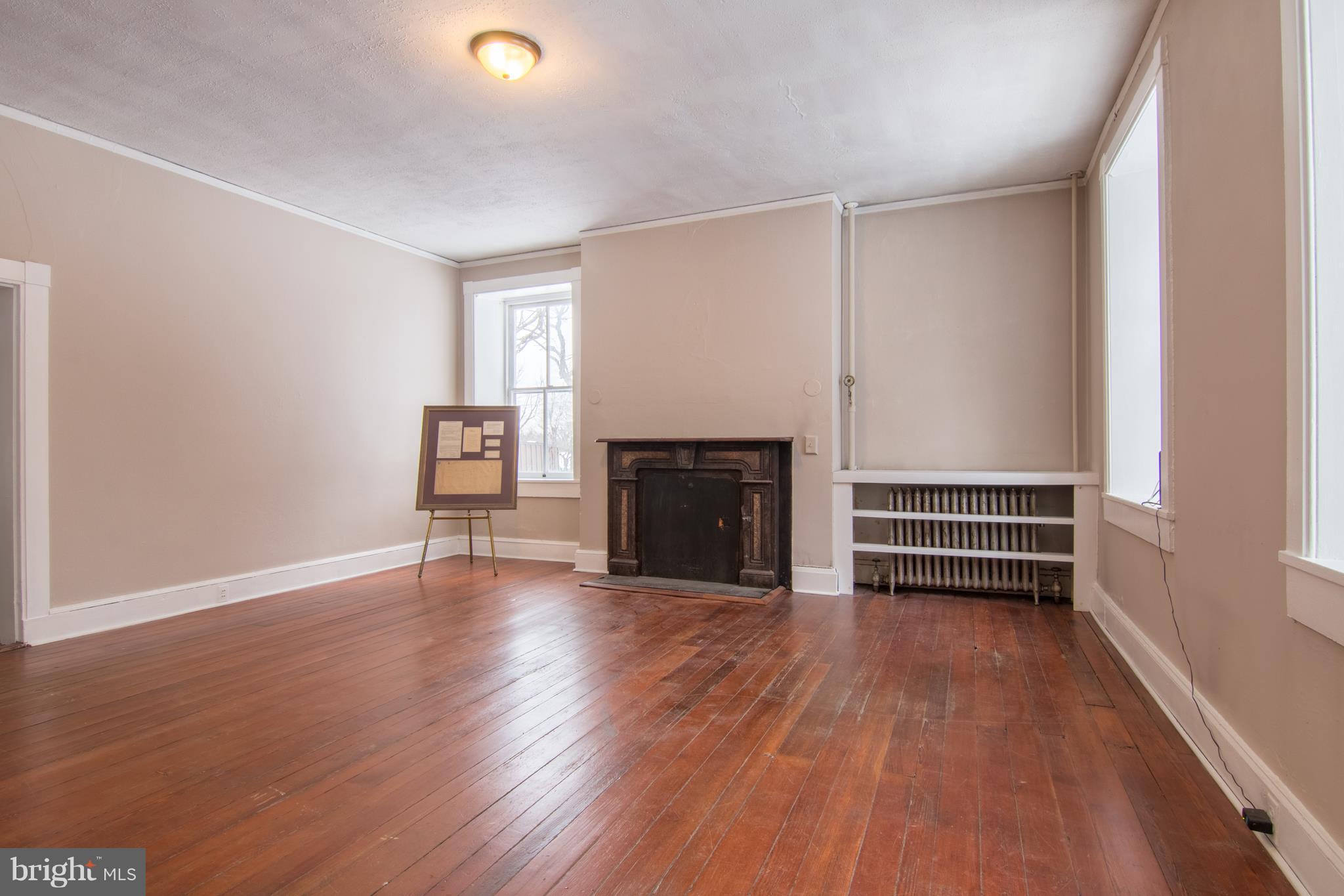 4824 Montgomery Road Ellicott City, MD 21043 - Photo 41 of 84 Dining room w/Fireplace