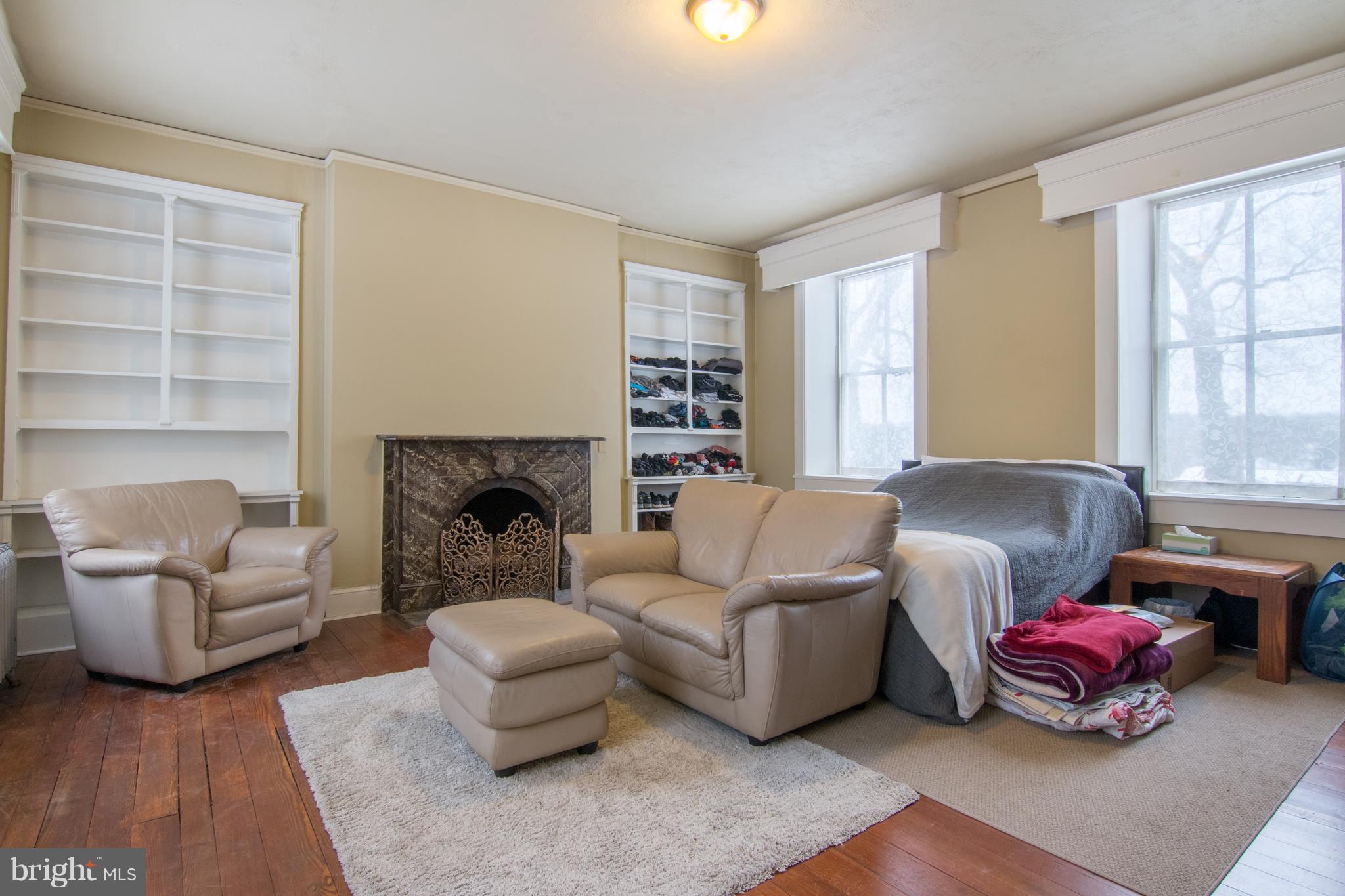 4824 Montgomery Road Ellicott City, MD 21043 - Photo 44 of 84 Living room use a bedroom w/Fireplace