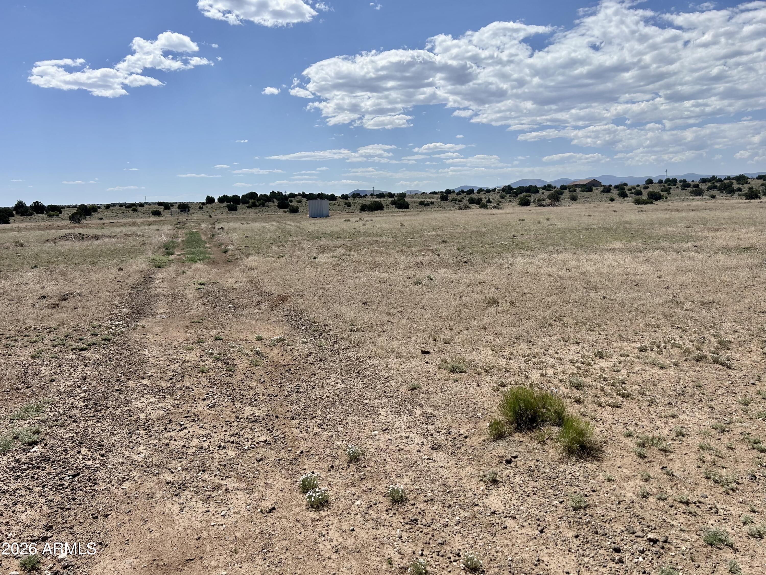Tbd Tbd Windsor Valley Ranch, Unit 135 Concho, AZ 85924 - Photo 7 of 8 a view of an ocean beach and a yard