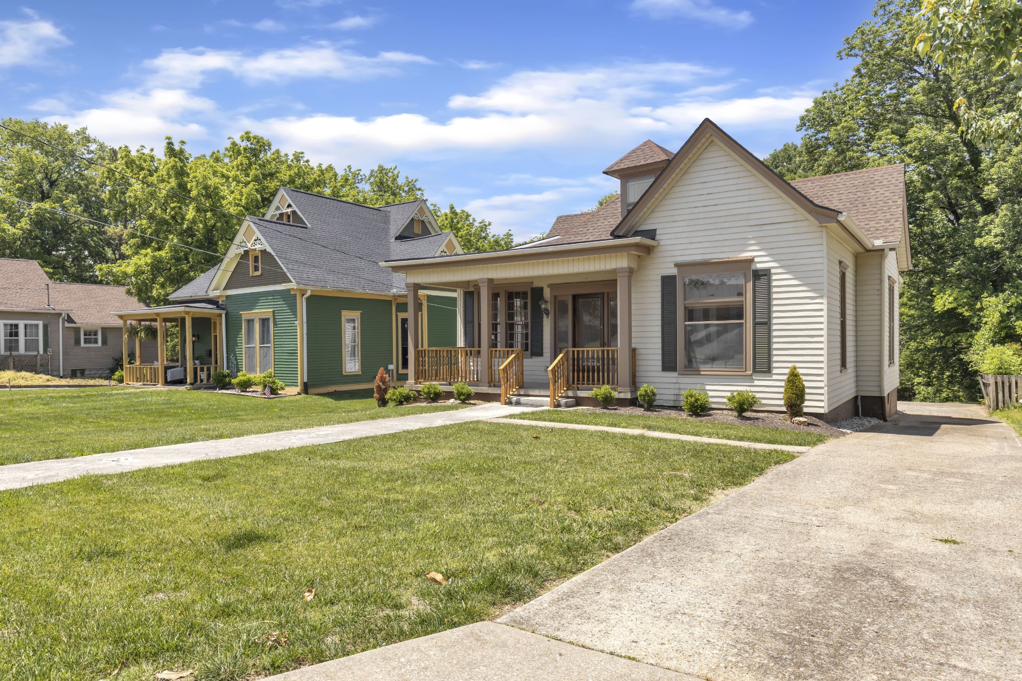 115 North Main Street Springfield, TN 37172 - Photo 3 of 24 a front view of a house with swimming pool having outdoor seating