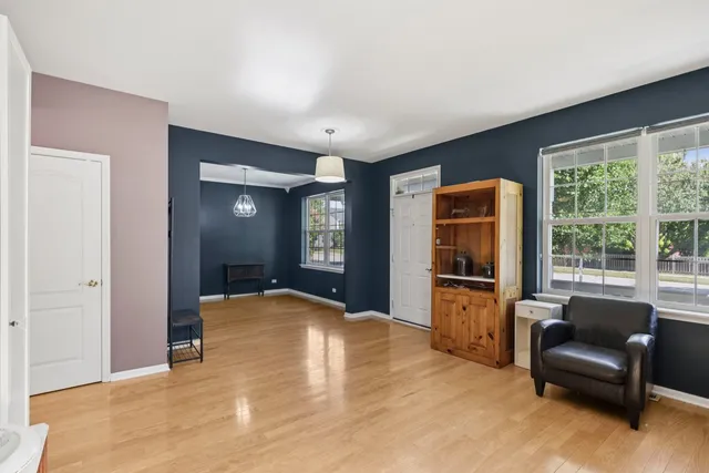 a view of a livingroom with furniture and windows