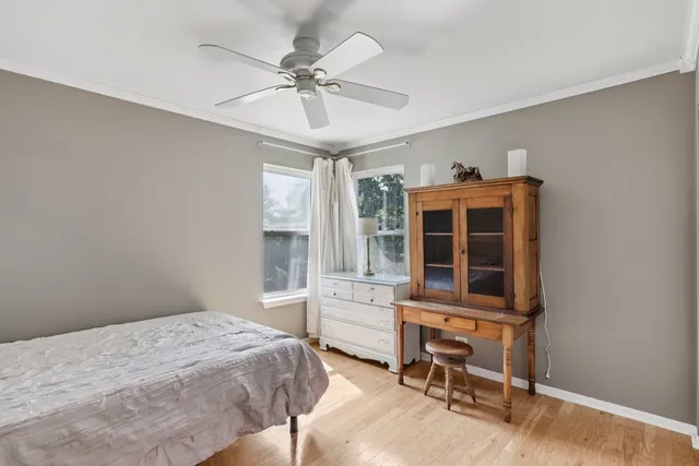 a bedroom with a bed and a cabinets