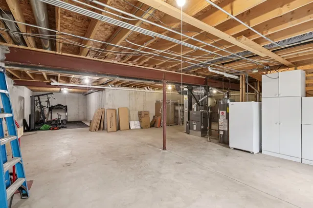 a view of empty room with wooden ceiling