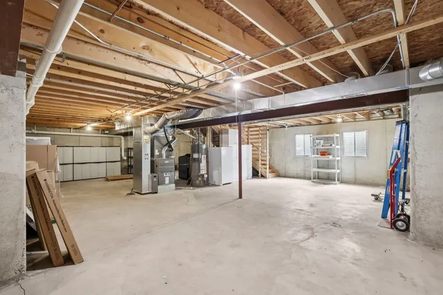 a view of a empty room with wooden floor