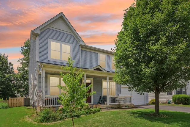 front view of house with a yard