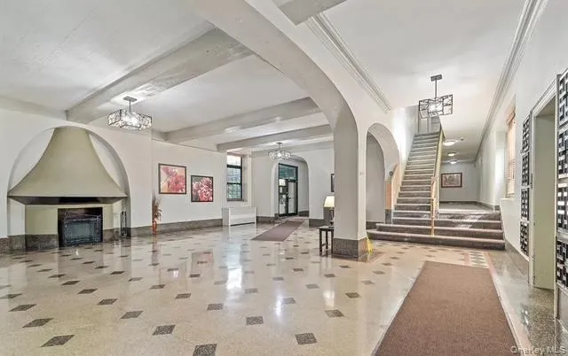 a view of a hallway with a couch