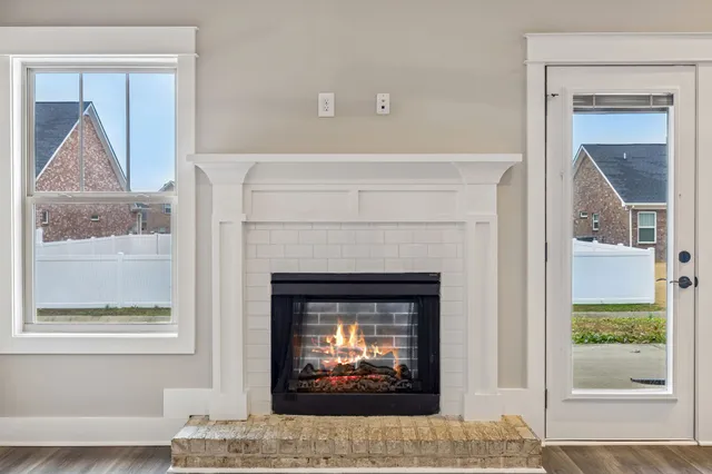 a bathroom with a double vanity sink and mirror