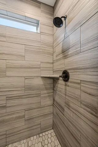 a kitchen with stainless steel appliances a refrigerator sink and microwave