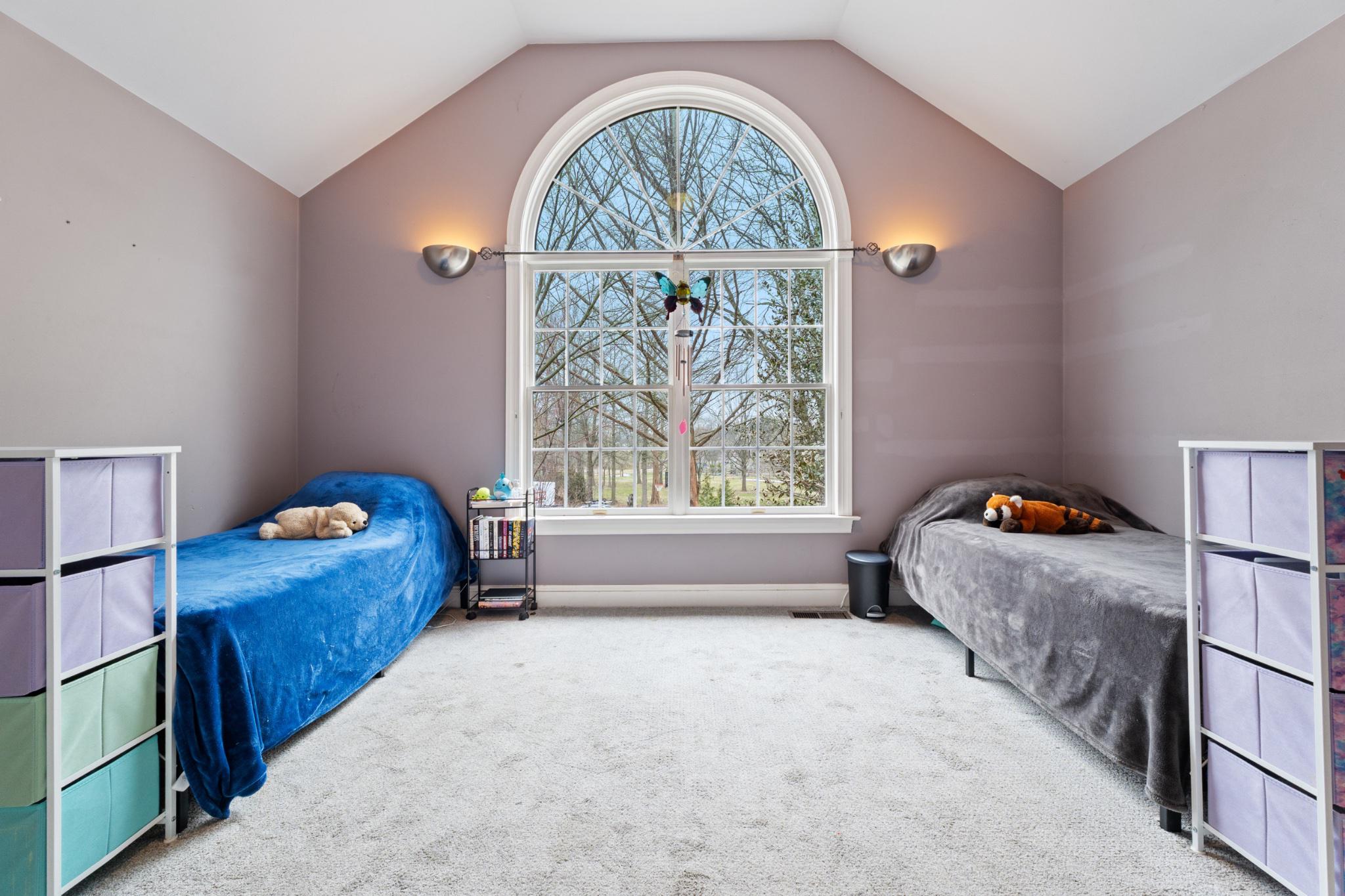 40 Christman Road Kutztown, PA 19530 - Photo 20 of 48 a spacious bedroom with a bed and a window