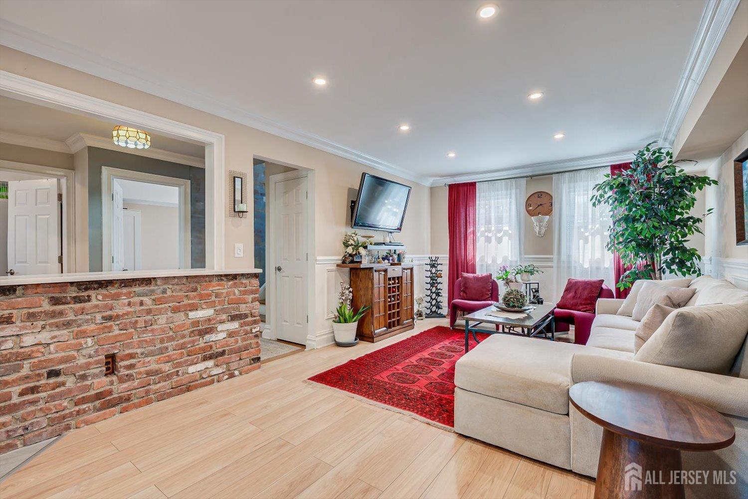 71 Crosby Avenue Edison, NJ 08817 - Photo 24 of 40 a living room with furniture and a large window