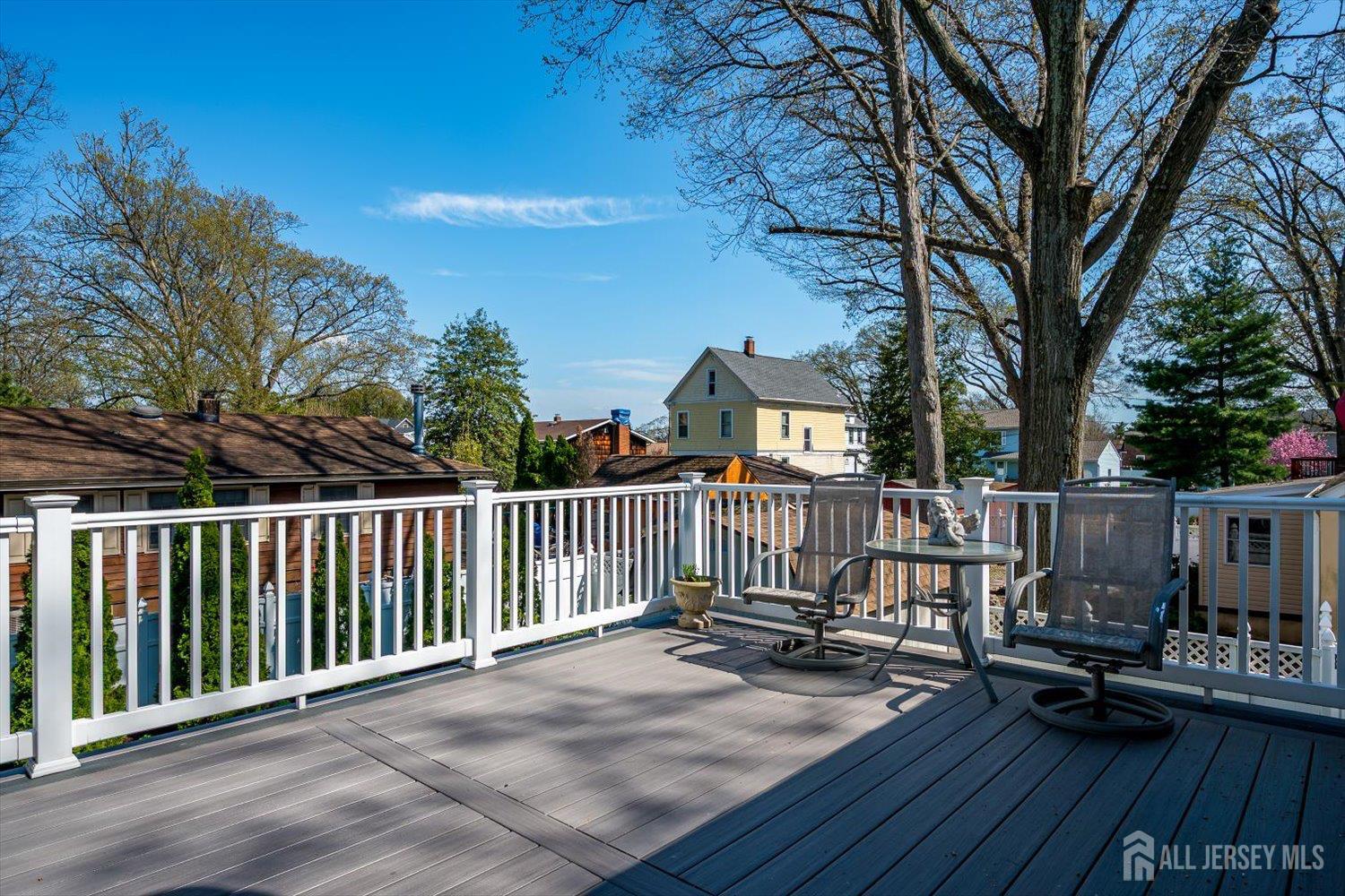 71 Crosby Avenue Edison, NJ 08817 - Photo 31 of 40 a view of a deck with wooden floor and fence