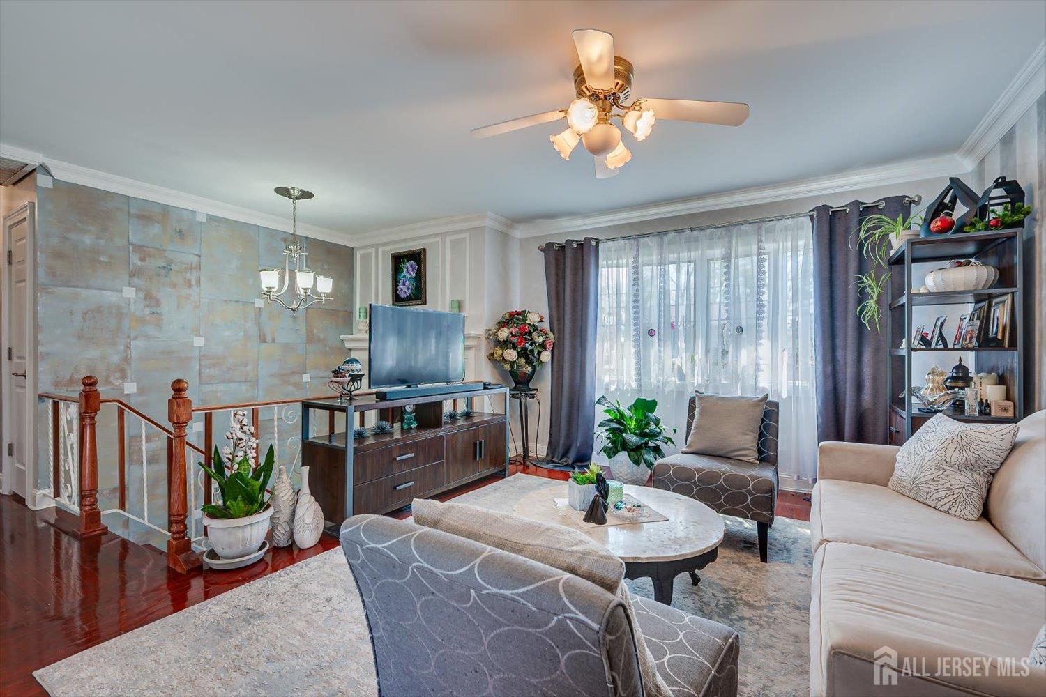71 Crosby Avenue Edison, NJ 08817 - Photo 5 of 40 a living room with furniture and a wooden floor