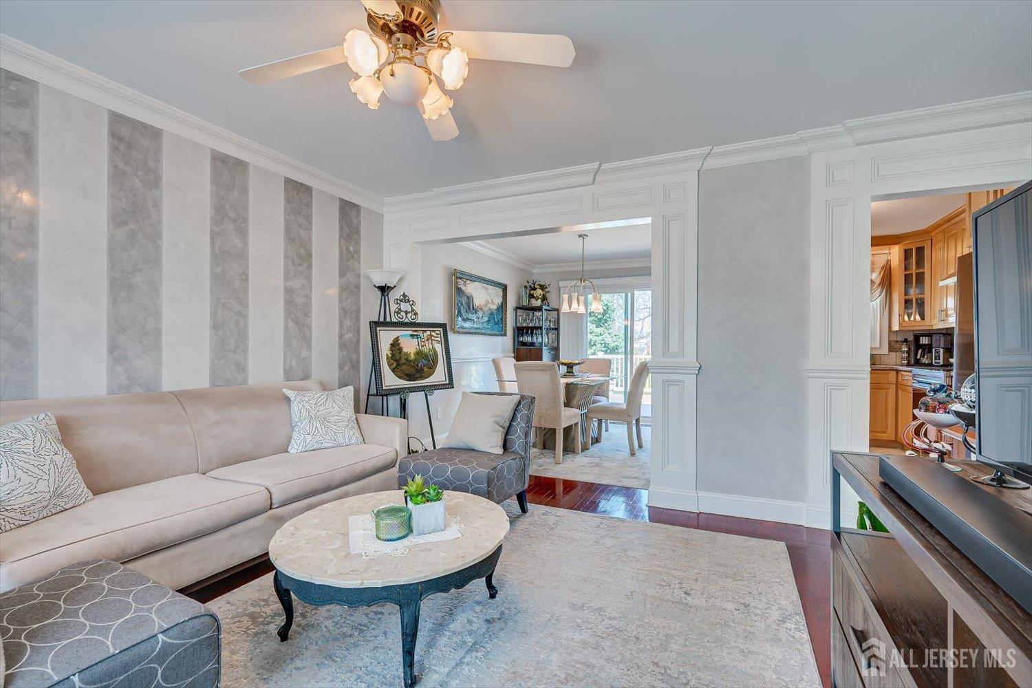 71 Crosby Avenue Edison, NJ 08817 - Photo 6 of 40 a living room with furniture and a wooden floor