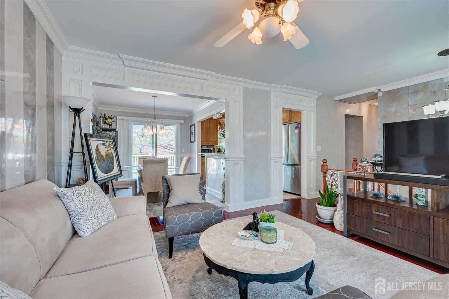 71 Crosby Avenue Edison, NJ 08817 - Photo 7 of 40 a living room with furniture and a flat screen tv