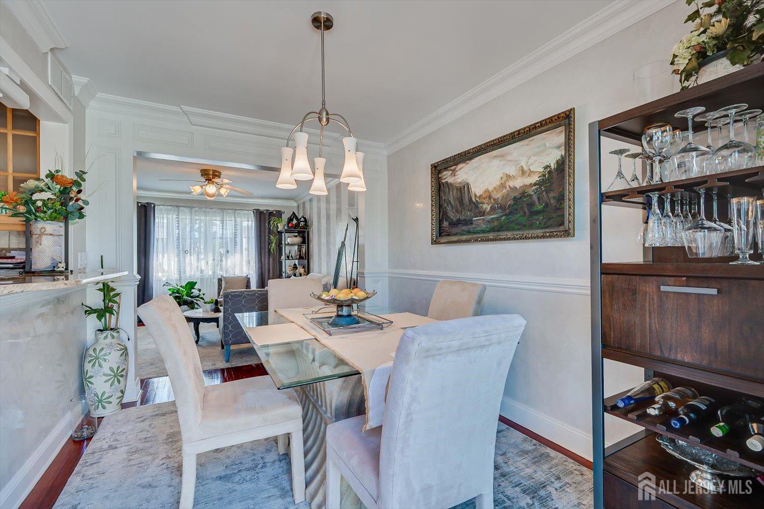 71 Crosby Avenue Edison, NJ 08817 - Photo 9 of 40 a view of a dining room with furniture and chandelier