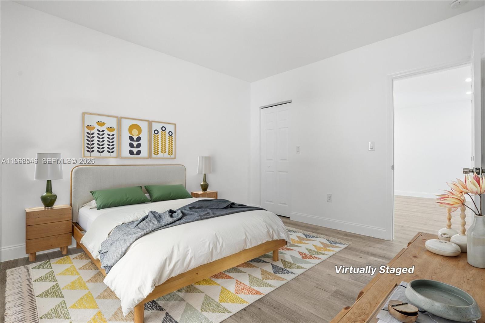 4237 Southwest 7th Street Miami, FL 33134 - Photo 20 of 31 a bedroom with a bed and a painting on the wall