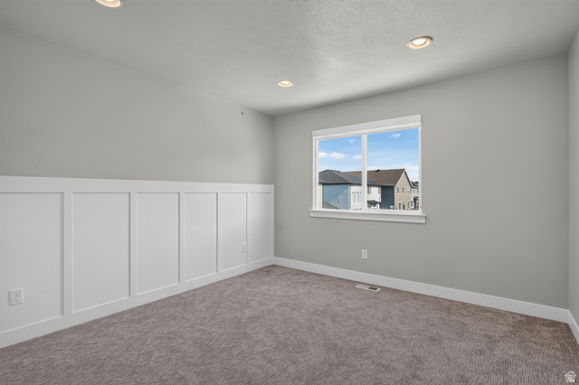36 West Syracuse Road Vineyard, UT 84059 - Photo 38 of 56 Interior room featuring board and batten wainscoting, recessed lighting, and a neutral color palette