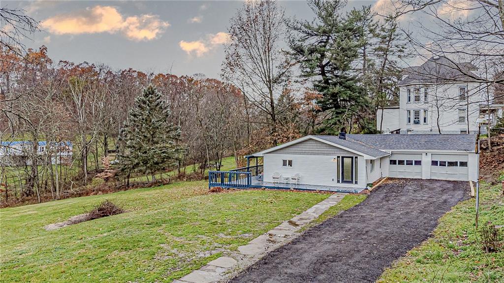 2087 White Cloud Road Leechburg, PA 15656 - Photo 2 of 25 a view of house with a big yard and large trees