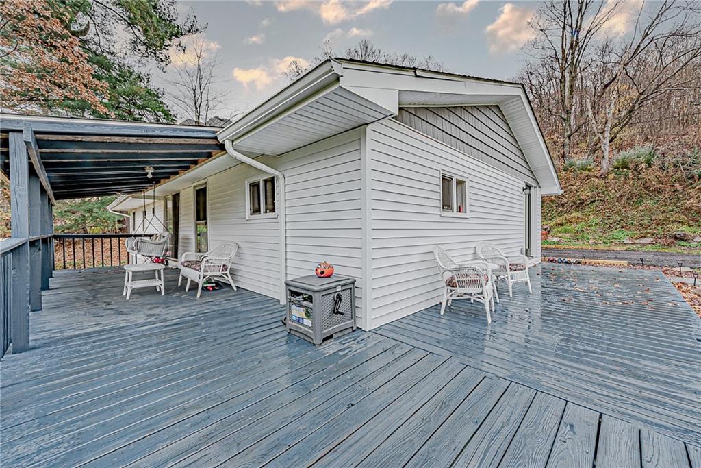 2087 White Cloud Road Leechburg, PA 15656 - Photo 22 of 25 a roof deck with table and chairs and wooden floor