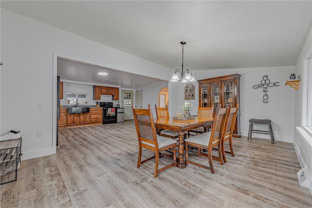 2087 White Cloud Road Leechburg, PA 15656 - Photo 4 of 25 a view of a dining room with furniture and wooden floor