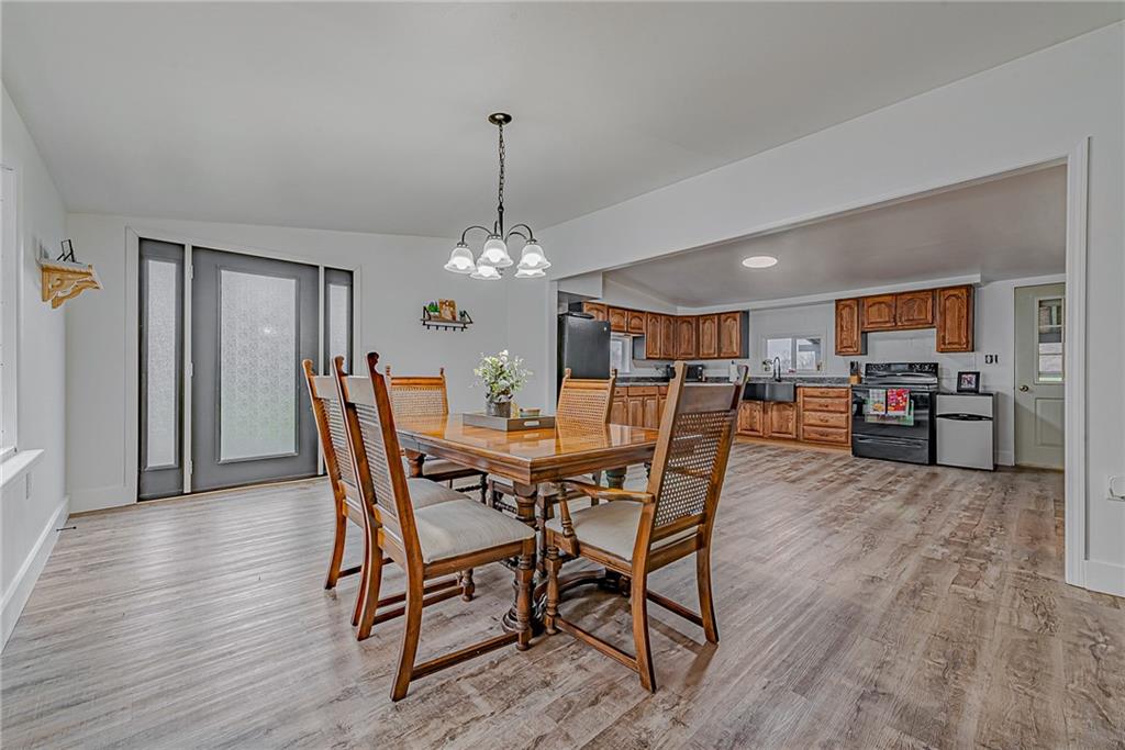 2087 White Cloud Road Leechburg, PA 15656 - Photo 5 of 25 a view of a dining room with furniture and wooden floor