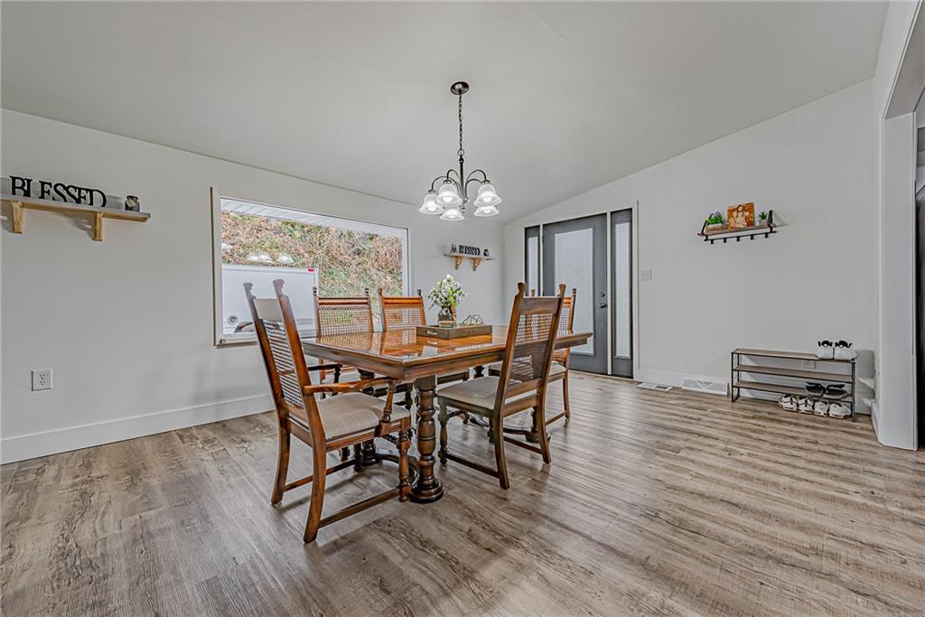 2087 White Cloud Road Leechburg, PA 15656 - Photo 6 of 25 a view of a dining room with furniture window and wooden floor